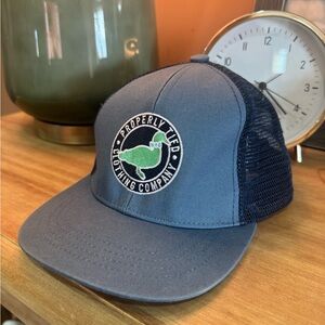 Properly Tied Kids' Navy Trucker Hat with Green Logo